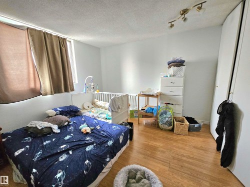 718 13910 Stony Plain Road, Edmonton, AB - Indoor Photo Showing Bedroom