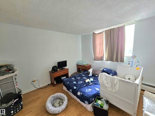 718 13910 Stony Plain Road, Edmonton, AB - Indoor Photo Showing Bedroom