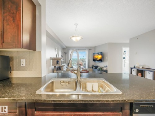 404 270 Mcconachie Drive, Edmonton, AB - Indoor Photo Showing Kitchen With Double Sink