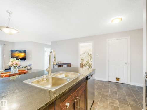 404 270 Mcconachie Drive, Edmonton, AB - Indoor Photo Showing Kitchen With Double Sink