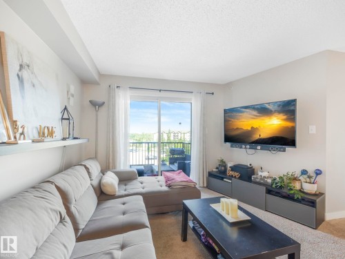404 270 Mcconachie Drive, Edmonton, AB - Indoor Photo Showing Living Room