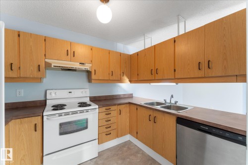 209 70 Alpine Place, St. Albert, AB - Indoor Photo Showing Kitchen With Double Sink