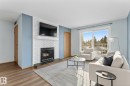 209 70 Alpine Place, St. Albert, AB  - Indoor Photo Showing Living Room With Fireplace 