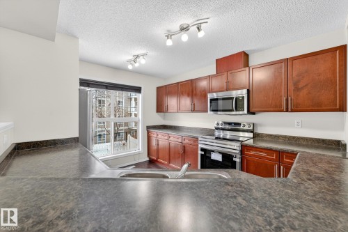 48 5604 199 Street, Edmonton, AB - Indoor Photo Showing Kitchen With Stainless Steel Kitchen With Double Sink
