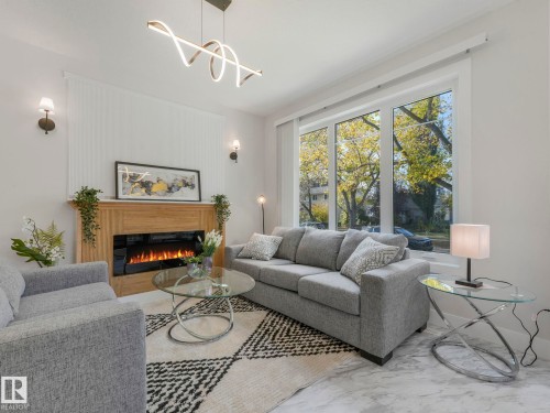 11219 125 Street, Edmonton, AB - Indoor Photo Showing Living Room With Fireplace