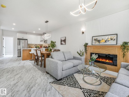 11219 125 Street, Edmonton, AB - Indoor Photo Showing Living Room With Fireplace