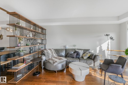 409 625 Leger Way, Edmonton, AB - Indoor Photo Showing Living Room