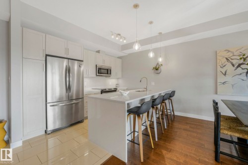 409 625 Leger Way, Edmonton, AB - Indoor Photo Showing Kitchen With Upgraded Kitchen