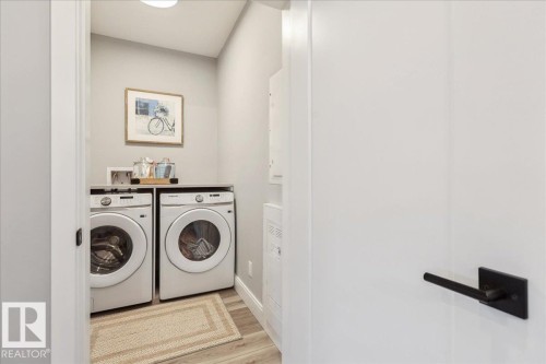 301 7463 May Common, Edmonton, AB - Indoor Photo Showing Laundry Room