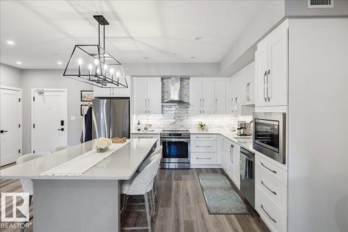 301 7463 May Common, Edmonton, AB - Indoor Photo Showing Kitchen With Upgraded Kitchen