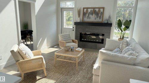 6235 175 Avenue, Edmonton, AB - Indoor Photo Showing Living Room With Fireplace