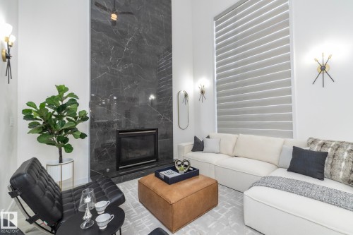 926 Thompson Place, Edmonton, AB - Indoor Photo Showing Living Room With Fireplace