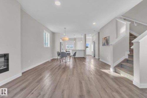 37 Sienna Boulevard, Fort Saskatchewan, AB - Indoor Photo Showing Living Room With Fireplace