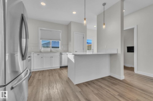 37 Sienna Boulevard, Fort Saskatchewan, AB - Indoor Photo Showing Kitchen With Upgraded Kitchen