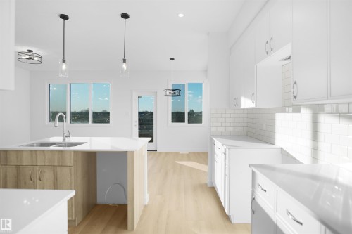 1753 Westerra Wynd, Stony Plain, AB - Indoor Photo Showing Kitchen With Double Sink