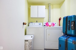 Laundry area with cabinet space and washing machine and dryer - 