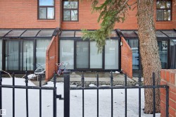 Entrance to property featuring brick siding - 