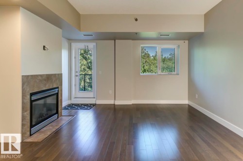205 9316 82 Avenue, Edmonton, AB - Indoor With Fireplace