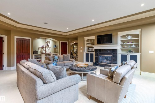 129 Riverview Crescent, Rural Sturgeon County, AB - Indoor Photo Showing Living Room With Fireplace
