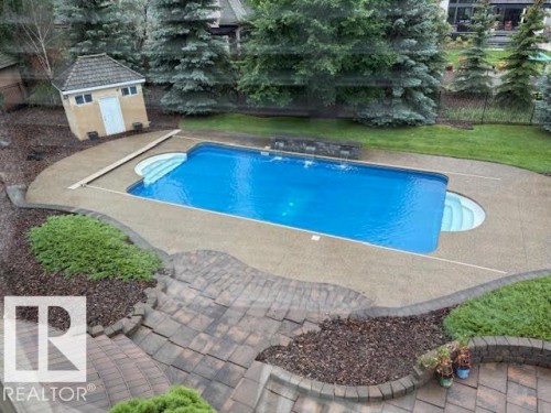 129 Riverview Crescent, Rural Sturgeon County, AB - Outdoor With In Ground Pool With Backyard