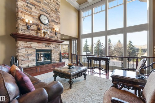 129 Riverview Crescent, Rural Sturgeon County, AB - Indoor Photo Showing Living Room With Fireplace