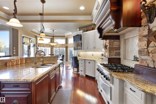 129 Riverview Crescent, Rural Sturgeon County, AB - Indoor Photo Showing Kitchen With Double Sink