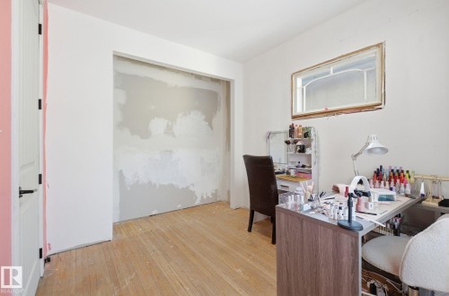 Home office featuring light wood-style floors - 11515 101 Street, Edmonton, AB - Indoor Photo Showing Other Room