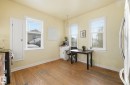 Office area with dark wood-style floors, healthy amount of natural light, and a chandelier - 11515 101 Street, Edmonton, AB  - Indoor 