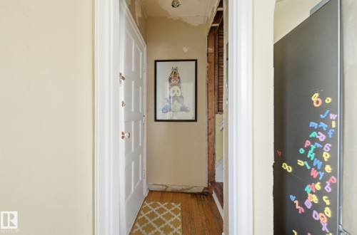 Hallway with hardwood / wood-style flooring - 11515 101 Street, Edmonton, AB - Indoor Photo Showing Other Room