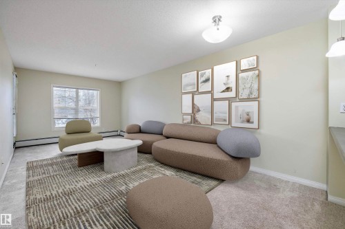 213 636 Mcallister Loop, Edmonton, AB - Indoor Photo Showing Living Room