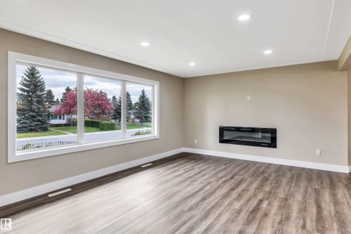 12904 95A Street, Edmonton, AB - Indoor Photo Showing Other Room With Fireplace