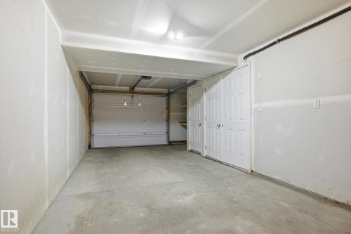 111 3305 Orchards Link, Edmonton, AB - Indoor Photo Showing Garage