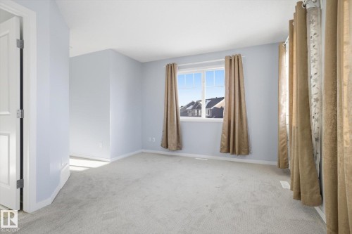111 3305 Orchards Link, Edmonton, AB - Indoor Photo Showing Other Room
