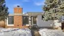 View of front facade with a chimney and brick siding - 10478 21 Avenue, Edmonton, AB  - Outdoor 