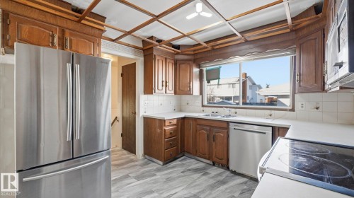 10478 21 Avenue, Edmonton, AB - Indoor Photo Showing Kitchen With Double Sink