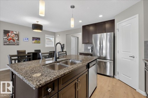 5220 20 Avenue Sw, Edmonton, AB - Indoor Photo Showing Kitchen With Double Sink