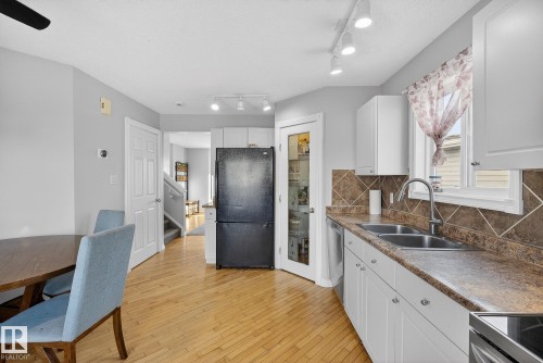 14816 47 Street, Edmonton, AB - Indoor Photo Showing Kitchen With Double Sink