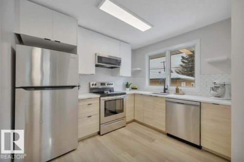 10239 50 Street, Edmonton, AB - Indoor Photo Showing Kitchen With Stainless Steel Kitchen
