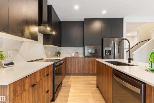 15832 22 Avenue, Edmonton, AB - Indoor Photo Showing Kitchen With Stainless Steel Kitchen With Upgraded Kitchen