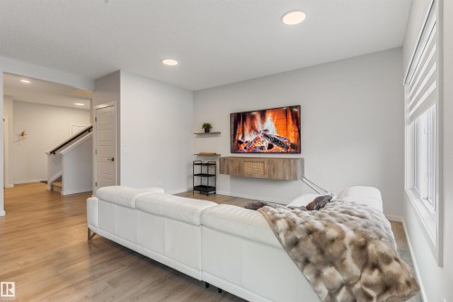 15832 22 Avenue, Edmonton, AB - Indoor Photo Showing Living Room