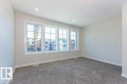 Spare room with carpet and recessed lighting - 