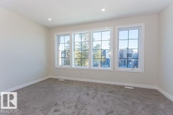 Unfurnished room featuring carpet flooring and recessed lighting - 