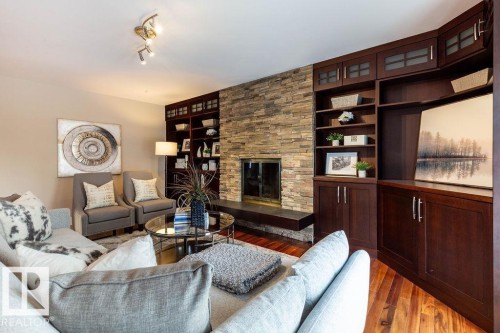 104 Quesnell Crescent, Edmonton, AB - Indoor Photo Showing Living Room With Fireplace