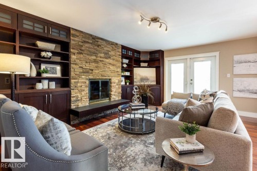 104 Quesnell Crescent, Edmonton, AB - Indoor Photo Showing Living Room With Fireplace