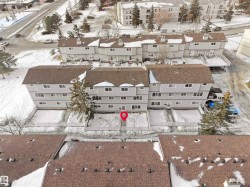 Snowy aerial view featuring a residential view - 