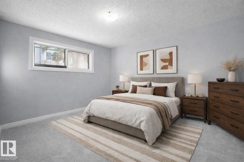 Virtually stagec - Second bedroom featuring carpet floors and a textured ceiling - 1460 Lakewood Road W, Edmonton, AB - Indoor Photo Showing Bedroom