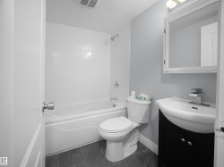 Full bath with vanity and shower / bathtub combination - 