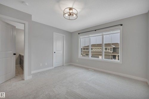 1558 Plum Circle Sw, Edmonton, AB - Indoor Photo Showing Other Room