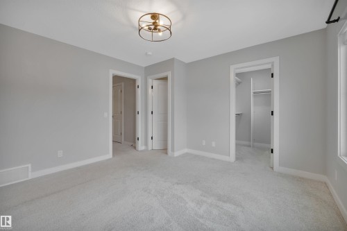 1558 Plum Circle Sw, Edmonton, AB - Indoor Photo Showing Other Room