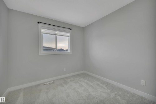 1558 Plum Circle Sw, Edmonton, AB - Indoor Photo Showing Other Room